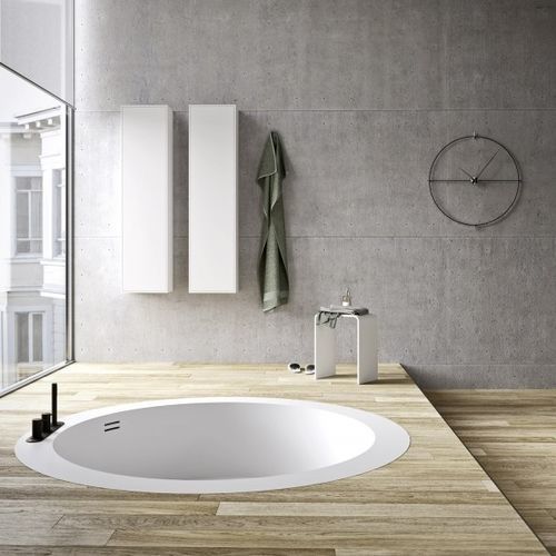 Baignoire ronde - Rexa Design - pour habitat / en Corian® / contemporaine