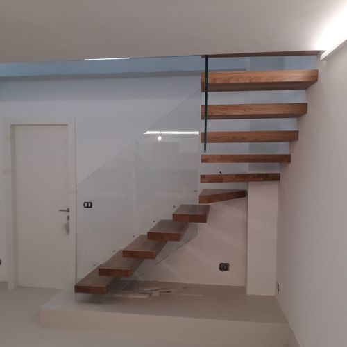Escalier quart tournant - MANHATTAN - TECNOSCALE - à marches en chêne / en métal / résidentiel