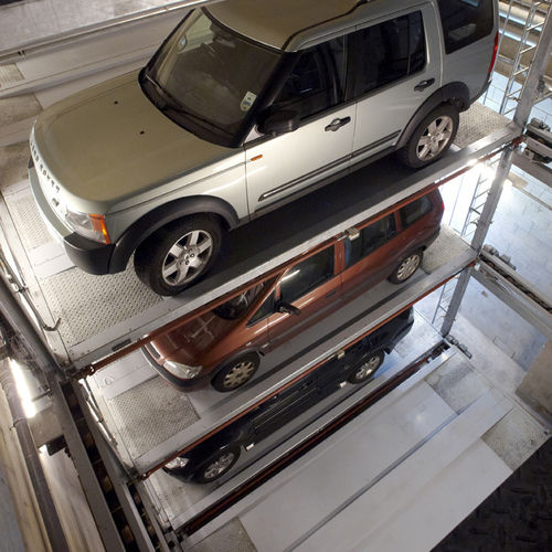 Système de stationnement avec plate-forme - MASTERVARIO F2 - KLAUS Multiparking GmbH - avec ascenseur