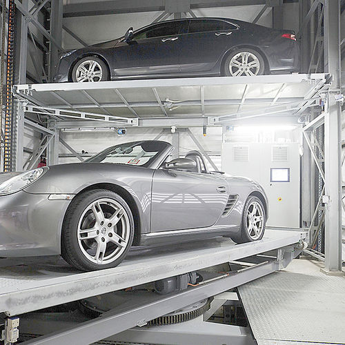 Système de stationnement avec plate-forme - MASTERVARIO R2C - KLAUS Multiparking GmbH - avec ascenseur