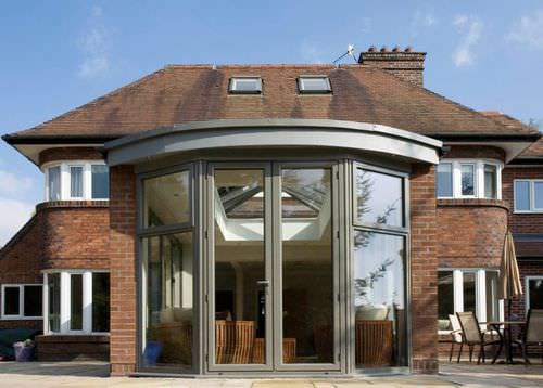 Véranda en verre - ORANGERIES - Apropos Tectonic Limited - en métal / maçonnée
