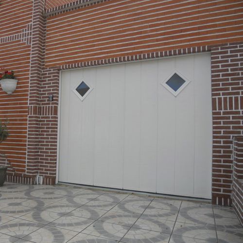 Porte de garage coulissante - SMF Services - en aluminium / en acier inoxydable / en mousse de polyuréthane