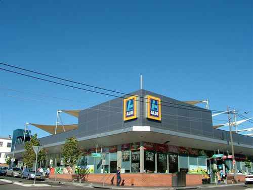 Bardage en panneaux - ALDI LAKEMBA - Vitragroup - en fibro-ciment / brillant