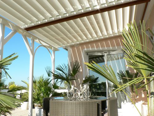 Pergola adossée - SOLISYSTEME - en aluminium / à lames orientables / bioclimatique