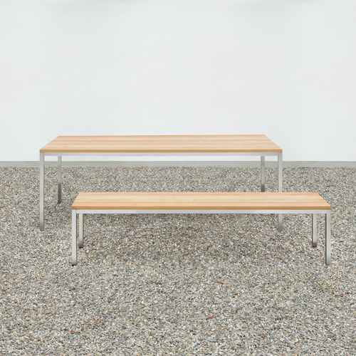 Table contemporaine - at_20 - Silvio Rohrmoser - en bois massif / en mélèze / avec piètement en acier inoxydable poli