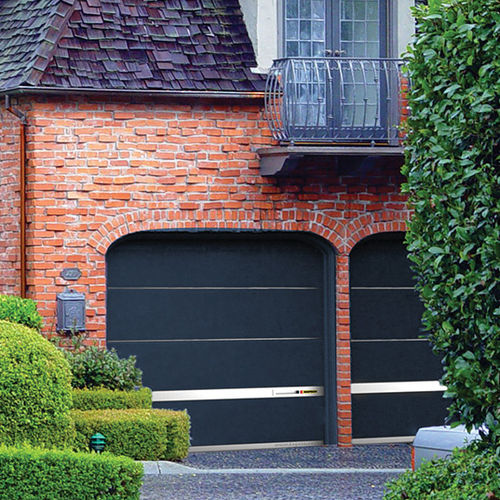 Porte de garage sectionnelle - MODERN  - KOPRON - en acier / automatique / avec hublot