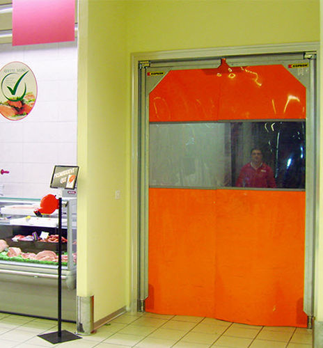 Porte industrielle battante - KOPRON - en métal / en PVC / automatique