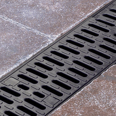 Caniveau à grille - HexDrain Pro - ACO Building Drainage - en composite / en polypropylène / pour espace public