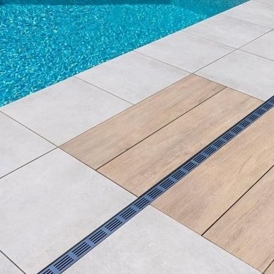 Caniveau à grille - StepDrain - ACO Building Drainage - grille en acier inox / pour pavage / de terrasse