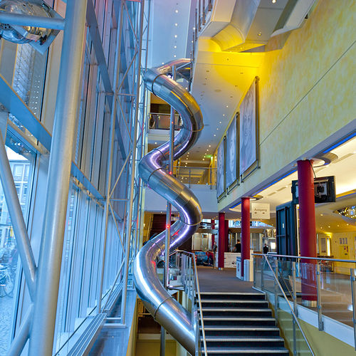 Toboggan tournant - CINEMAXX FREIBURG  - atlantics GmbH - pour aire de jeux / en acier inoxydable / tubulaire