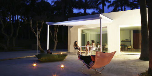 Pergola adossée - SUITE - UNOSIDER - en aluminium / couverture coulissante en toile PVC / sur mesure