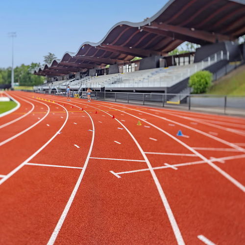 Sol sportif d'extérieur - GEL GT - Polytan GmbH - en polyuréthane / en EPDM / pour stade