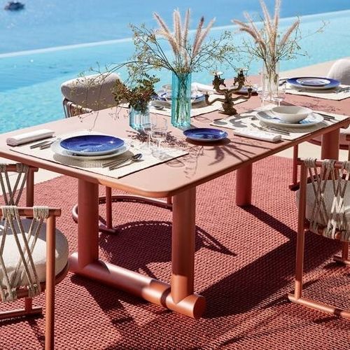 Table à manger contemporaine - TRAMPOLINE - Cassina - en béton / en marbre / avec piètement en aluminium thermolaqué