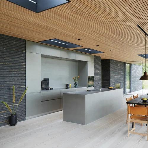 Cuisine contemporaine - Seaside Resort - eggersmann küchen GmbH & Co. KG - en inox brossé / avec îlot / dissimulée