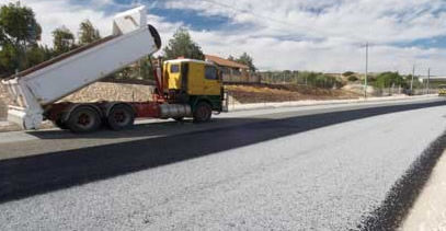 Revêtement de sol en ciment - CRUSHED ROCK - Cultured Stone Products - en gravier / pour extérieur / routier
