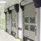porte industrielle pliante / en inox / automatique / grande hauteur