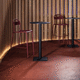 table mange-debout contemporaine / en HPL / avec piètement en fonte / ronde