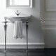 vasque console / en porcelaine / avec plan intégré / avec porte-serviettes intégré