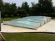 abri de piscine bas / télescopique / en aluminium / en polycarbonate