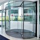 porte d'entrée / en inox / à tambour / vitrée