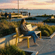banc public design / en acier / en bois / avec dossier