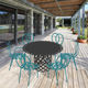 table à manger contemporaine / en aluminium peint / ronde / résidentielle