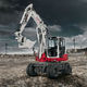 pelle mini / sur pneus / pivotante / pour chantier