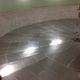 revêtement de sol en acier inoxydable / d'intérieur / pour le tertiaire / en dalles