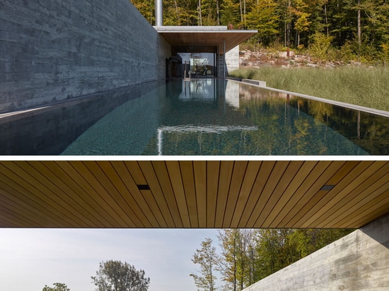 Cette Chambre de piscine comporte de longs murs en béton Panneau-formés et une cheminée extérieure