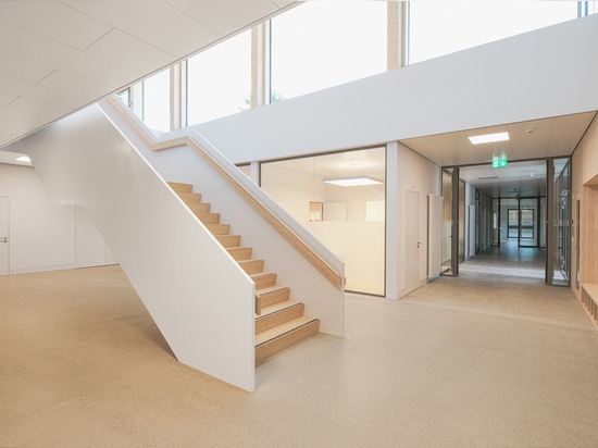 Nouveau bâtiment scolaire et salle de sport / Rykart Architekten AG