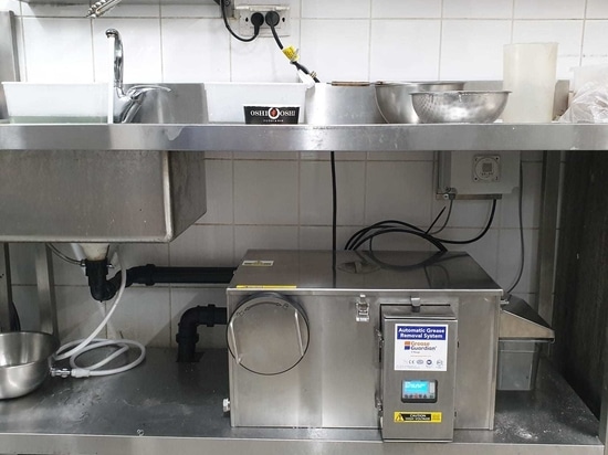 Installation compacte du séparateur à graisses automatique Grease Guardian