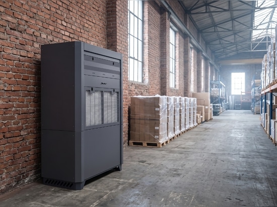 Déshumidificateur industriel DanVex DEH-5K installé dans un entrepôt en briques non chauffé